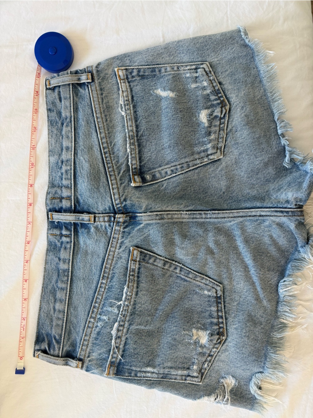 Agolde Light Blue Distressed Denim Cutoff Shorts